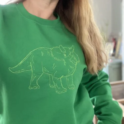 dino lucky threads dino on green sweater