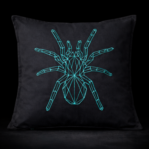 Geometric spider cushion cover in turquoise thread on black cotton